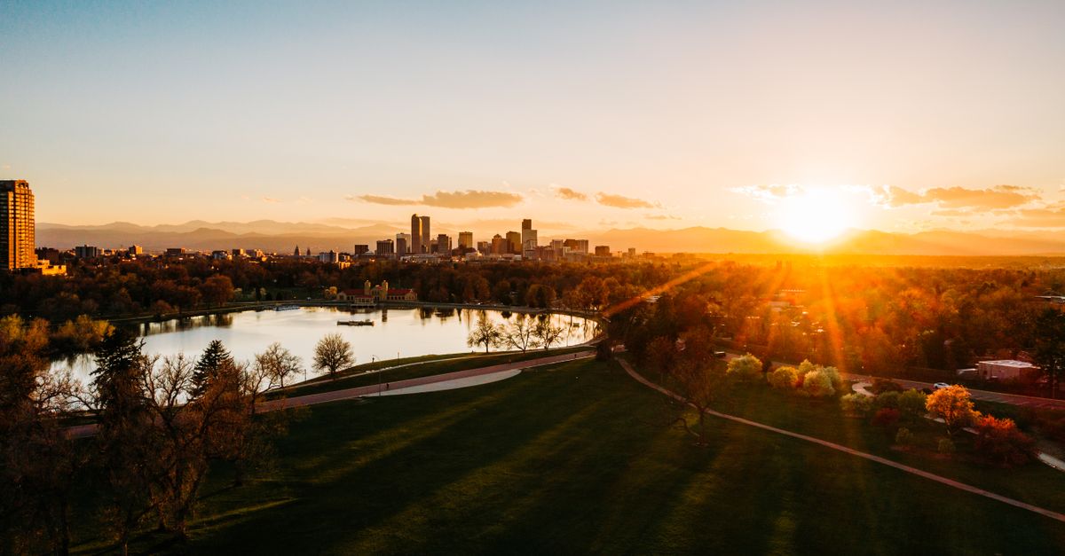 Denver, Colorado with the Rocky Mountains behind it, a metro with a continuous public Montessori pathway from preschool through high school